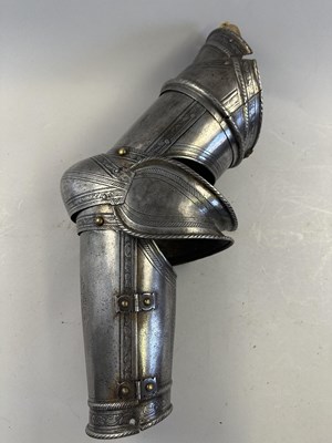 Lot 170 - A COMPOSITE NORTH ITALIAN CAP-A-PIE ARMOUR WITH ETCHED DECORATION, LATE 16TH CENTURY, THE BACKPLATE SIGNED BY THE MASTER ‘P’