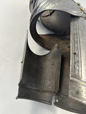 Lot 170 - A COMPOSITE NORTH ITALIAN CAP-A-PIE ARMOUR WITH ETCHED DECORATION, LATE 16TH CENTURY, THE BACKPLATE SIGNED BY THE MASTER ‘P’