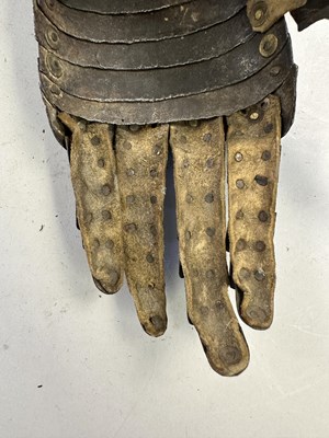 Lot 170 - A COMPOSITE NORTH ITALIAN CAP-A-PIE ARMOUR WITH ETCHED DECORATION, LATE 16TH CENTURY, THE BACKPLATE SIGNED BY THE MASTER ‘P’