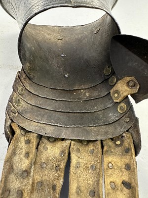 Lot 170 - A COMPOSITE NORTH ITALIAN CAP-A-PIE ARMOUR WITH ETCHED DECORATION, LATE 16TH CENTURY, THE BACKPLATE SIGNED BY THE MASTER ‘P’
