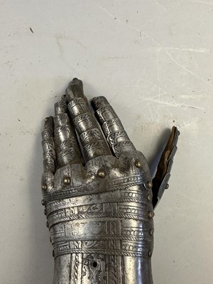 Lot 170 - A COMPOSITE NORTH ITALIAN CAP-A-PIE ARMOUR WITH ETCHED DECORATION, LATE 16TH CENTURY, THE BACKPLATE SIGNED BY THE MASTER ‘P’