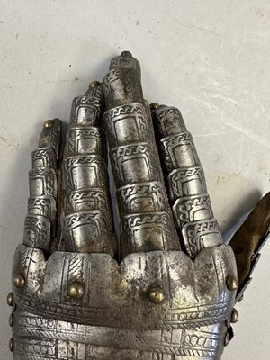 Lot 170 - A COMPOSITE NORTH ITALIAN CAP-A-PIE ARMOUR WITH ETCHED DECORATION, LATE 16TH CENTURY, THE BACKPLATE SIGNED BY THE MASTER ‘P’