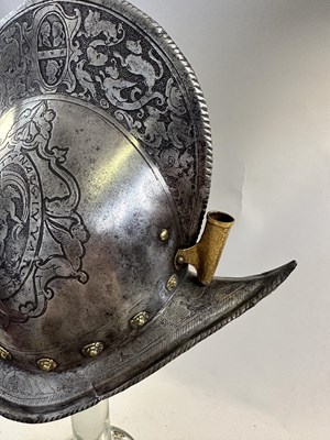 Lot 170 - A COMPOSITE NORTH ITALIAN CAP-A-PIE ARMOUR WITH ETCHED DECORATION, LATE 16TH CENTURY, THE BACKPLATE SIGNED BY THE MASTER ‘P’