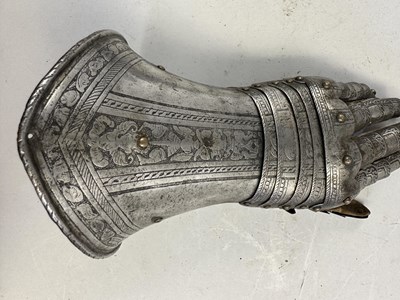 Lot 170 - A COMPOSITE NORTH ITALIAN CAP-A-PIE ARMOUR WITH ETCHED DECORATION, LATE 16TH CENTURY, THE BACKPLATE SIGNED BY THE MASTER ‘P’