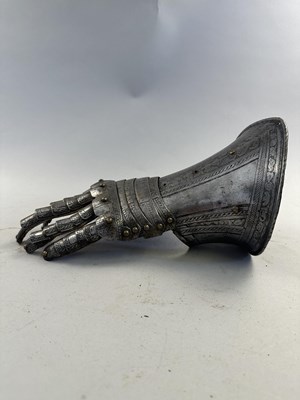 Lot 170 - A COMPOSITE NORTH ITALIAN CAP-A-PIE ARMOUR WITH ETCHED DECORATION, LATE 16TH CENTURY, THE BACKPLATE SIGNED BY THE MASTER ‘P’
