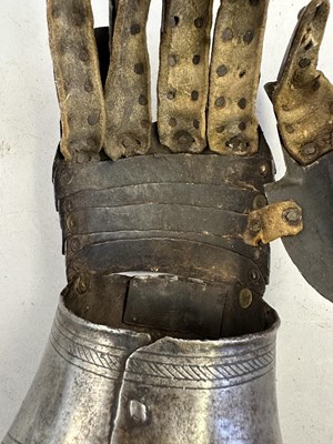 Lot 170 - A COMPOSITE NORTH ITALIAN CAP-A-PIE ARMOUR WITH ETCHED DECORATION, LATE 16TH CENTURY, THE BACKPLATE SIGNED BY THE MASTER ‘P’