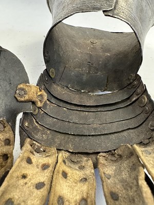 Lot 170 - A COMPOSITE NORTH ITALIAN CAP-A-PIE ARMOUR WITH ETCHED DECORATION, LATE 16TH CENTURY, THE BACKPLATE SIGNED BY THE MASTER ‘P’