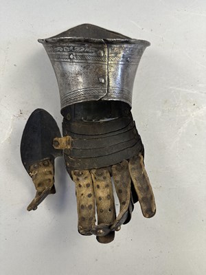Lot 170 - A COMPOSITE NORTH ITALIAN CAP-A-PIE ARMOUR WITH ETCHED DECORATION, LATE 16TH CENTURY, THE BACKPLATE SIGNED BY THE MASTER ‘P’