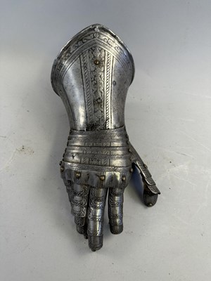 Lot 170 - A COMPOSITE NORTH ITALIAN CAP-A-PIE ARMOUR WITH ETCHED DECORATION, LATE 16TH CENTURY, THE BACKPLATE SIGNED BY THE MASTER ‘P’