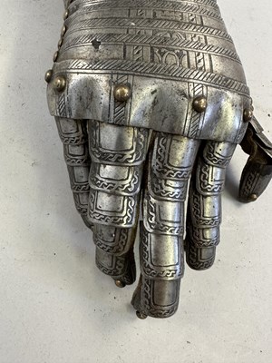 Lot 170 - A COMPOSITE NORTH ITALIAN CAP-A-PIE ARMOUR WITH ETCHED DECORATION, LATE 16TH CENTURY, THE BACKPLATE SIGNED BY THE MASTER ‘P’