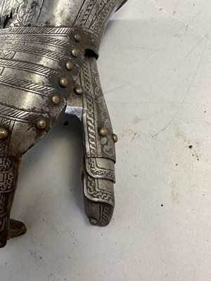 Lot 170 - A COMPOSITE NORTH ITALIAN CAP-A-PIE ARMOUR WITH ETCHED DECORATION, LATE 16TH CENTURY, THE BACKPLATE SIGNED BY THE MASTER ‘P’