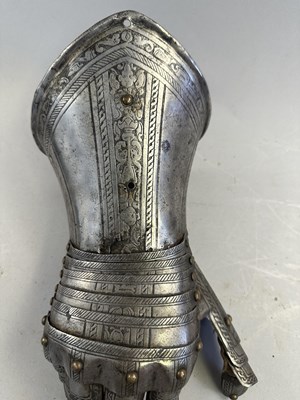 Lot 170 - A COMPOSITE NORTH ITALIAN CAP-A-PIE ARMOUR WITH ETCHED DECORATION, LATE 16TH CENTURY, THE BACKPLATE SIGNED BY THE MASTER ‘P’
