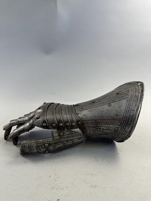 Lot 170 - A COMPOSITE NORTH ITALIAN CAP-A-PIE ARMOUR WITH ETCHED DECORATION, LATE 16TH CENTURY, THE BACKPLATE SIGNED BY THE MASTER ‘P’