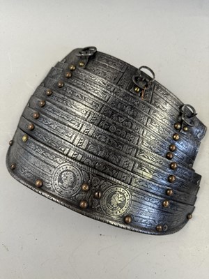 Lot 170 - A COMPOSITE NORTH ITALIAN CAP-A-PIE ARMOUR WITH ETCHED DECORATION, LATE 16TH CENTURY, THE BACKPLATE SIGNED BY THE MASTER ‘P’