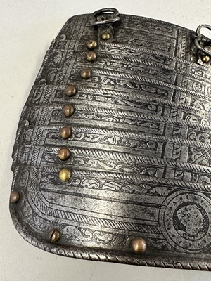 Lot 170 - A COMPOSITE NORTH ITALIAN CAP-A-PIE ARMOUR WITH ETCHED DECORATION, LATE 16TH CENTURY, THE BACKPLATE SIGNED BY THE MASTER ‘P’