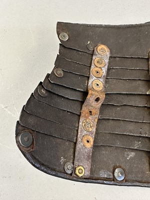 Lot 170 - A COMPOSITE NORTH ITALIAN CAP-A-PIE ARMOUR WITH ETCHED DECORATION, LATE 16TH CENTURY, THE BACKPLATE SIGNED BY THE MASTER ‘P’
