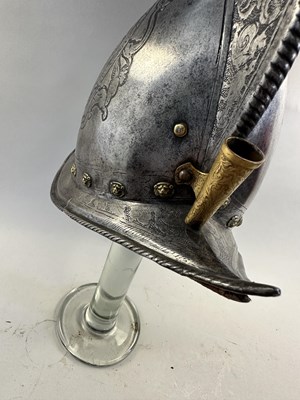 Lot 170 - A COMPOSITE NORTH ITALIAN CAP-A-PIE ARMOUR WITH ETCHED DECORATION, LATE 16TH CENTURY, THE BACKPLATE SIGNED BY THE MASTER ‘P’