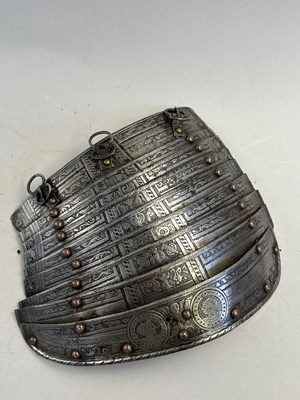 Lot 170 - A COMPOSITE NORTH ITALIAN CAP-A-PIE ARMOUR WITH ETCHED DECORATION, LATE 16TH CENTURY, THE BACKPLATE SIGNED BY THE MASTER ‘P’