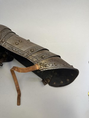 Lot 170 - A COMPOSITE NORTH ITALIAN CAP-A-PIE ARMOUR WITH ETCHED DECORATION, LATE 16TH CENTURY, THE BACKPLATE SIGNED BY THE MASTER ‘P’