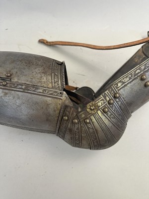 Lot 170 - A COMPOSITE NORTH ITALIAN CAP-A-PIE ARMOUR WITH ETCHED DECORATION, LATE 16TH CENTURY, THE BACKPLATE SIGNED BY THE MASTER ‘P’