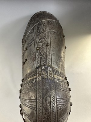 Lot 170 - A COMPOSITE NORTH ITALIAN CAP-A-PIE ARMOUR WITH ETCHED DECORATION, LATE 16TH CENTURY, THE BACKPLATE SIGNED BY THE MASTER ‘P’