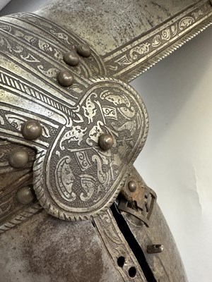 Lot 170 - A COMPOSITE NORTH ITALIAN CAP-A-PIE ARMOUR WITH ETCHED DECORATION, LATE 16TH CENTURY, THE BACKPLATE SIGNED BY THE MASTER ‘P’