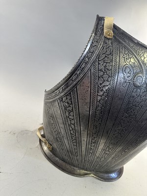 Lot 170 - A COMPOSITE NORTH ITALIAN CAP-A-PIE ARMOUR WITH ETCHED DECORATION, LATE 16TH CENTURY, THE BACKPLATE SIGNED BY THE MASTER ‘P’