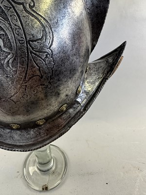 Lot 170 - A COMPOSITE NORTH ITALIAN CAP-A-PIE ARMOUR WITH ETCHED DECORATION, LATE 16TH CENTURY, THE BACKPLATE SIGNED BY THE MASTER ‘P’