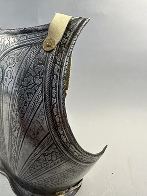 Lot 170 - A COMPOSITE NORTH ITALIAN CAP-A-PIE ARMOUR WITH ETCHED DECORATION, LATE 16TH CENTURY, THE BACKPLATE SIGNED BY THE MASTER ‘P’