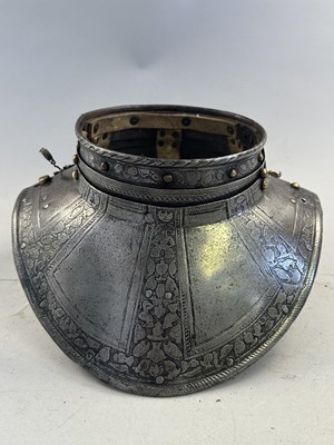 Lot 170 - A COMPOSITE NORTH ITALIAN CAP-A-PIE ARMOUR WITH ETCHED DECORATION, LATE 16TH CENTURY, THE BACKPLATE SIGNED BY THE MASTER ‘P’