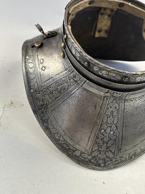 Lot 170 - A COMPOSITE NORTH ITALIAN CAP-A-PIE ARMOUR WITH ETCHED DECORATION, LATE 16TH CENTURY, THE BACKPLATE SIGNED BY THE MASTER ‘P’