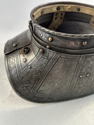 Lot 170 - A COMPOSITE NORTH ITALIAN CAP-A-PIE ARMOUR WITH ETCHED DECORATION, LATE 16TH CENTURY, THE BACKPLATE SIGNED BY THE MASTER ‘P’