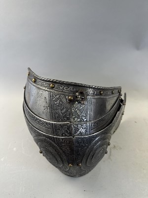 Lot 170 - A COMPOSITE NORTH ITALIAN CAP-A-PIE ARMOUR WITH ETCHED DECORATION, LATE 16TH CENTURY, THE BACKPLATE SIGNED BY THE MASTER ‘P’