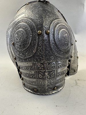Lot 170 - A COMPOSITE NORTH ITALIAN CAP-A-PIE ARMOUR WITH ETCHED DECORATION, LATE 16TH CENTURY, THE BACKPLATE SIGNED BY THE MASTER ‘P’
