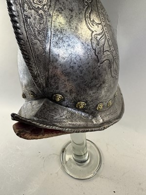 Lot 170 - A COMPOSITE NORTH ITALIAN CAP-A-PIE ARMOUR WITH ETCHED DECORATION, LATE 16TH CENTURY, THE BACKPLATE SIGNED BY THE MASTER ‘P’
