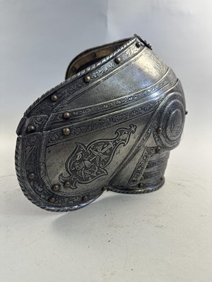 Lot 170 - A COMPOSITE NORTH ITALIAN CAP-A-PIE ARMOUR WITH ETCHED DECORATION, LATE 16TH CENTURY, THE BACKPLATE SIGNED BY THE MASTER ‘P’