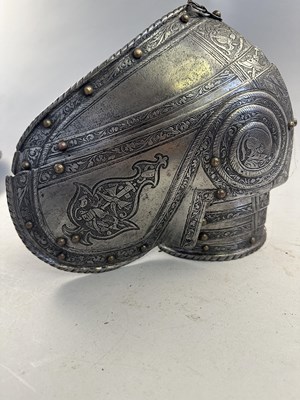 Lot 170 - A COMPOSITE NORTH ITALIAN CAP-A-PIE ARMOUR WITH ETCHED DECORATION, LATE 16TH CENTURY, THE BACKPLATE SIGNED BY THE MASTER ‘P’