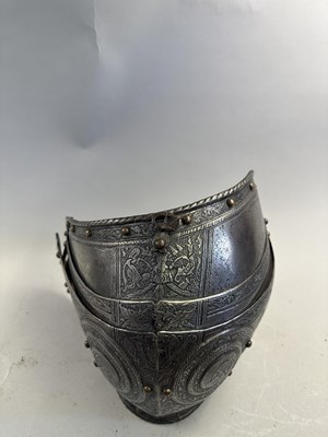 Lot 170 - A COMPOSITE NORTH ITALIAN CAP-A-PIE ARMOUR WITH ETCHED DECORATION, LATE 16TH CENTURY, THE BACKPLATE SIGNED BY THE MASTER ‘P’