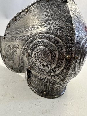 Lot 170 - A COMPOSITE NORTH ITALIAN CAP-A-PIE ARMOUR WITH ETCHED DECORATION, LATE 16TH CENTURY, THE BACKPLATE SIGNED BY THE MASTER ‘P’