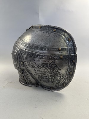 Lot 170 - A COMPOSITE NORTH ITALIAN CAP-A-PIE ARMOUR WITH ETCHED DECORATION, LATE 16TH CENTURY, THE BACKPLATE SIGNED BY THE MASTER ‘P’