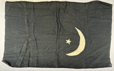 Lot 597 - □ A FLAG OR BANNER OF THE EMIRATE OF CYRENAICA (LIBYA), CIRCA 1949-51