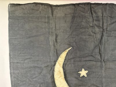 Lot 597 - □ A FLAG OR BANNER OF THE EMIRATE OF CYRENAICA (LIBYA), CIRCA 1949-51