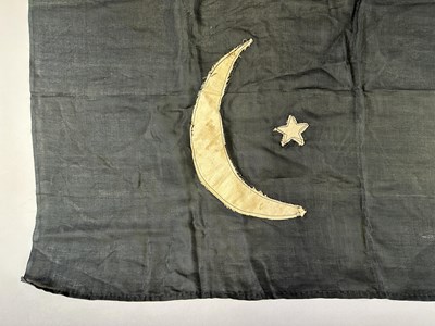 Lot 597 - □ A FLAG OR BANNER OF THE EMIRATE OF CYRENAICA (LIBYA), CIRCA 1949-51