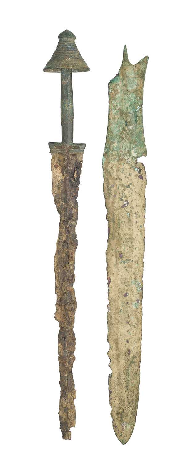 Lot 124 - A LURISTAN DAGGER, IRON AGE II, 1100-900 B.C. AND A LURISTAN COPPER ALLOY DAGGER, 1000 B.C.