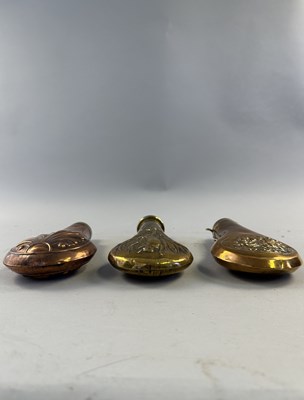 Lot 612 - □ THREE COPPER ALLOY POWDER-FLASKS, 19TH CENTURY AND LATER