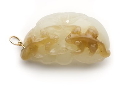 Lot 13 - A CHINESE PALE CELADON AND RUSSET JADE ‘DOUBLE-GOURD PENDANT, QING DYNASTY, 19TH CENTURY