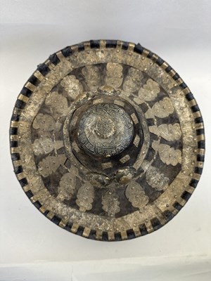Lot 565 - AN EAST AFRICAN WHITE-METAL MOUNTED HIDE SHIELD, LATE 19TH/20TH CENTURY