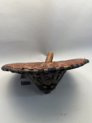 Lot 565 - AN EAST AFRICAN WHITE-METAL MOUNTED HIDE SHIELD, LATE 19TH/20TH CENTURY