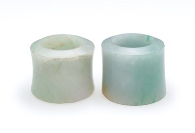 Lot 521 - □ TWO CHINESE JADEITE ARCHERS RINGS, QING DYNASTY, 19TH CENTURY