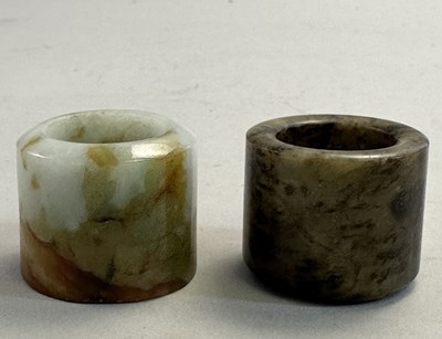 Lot 515 - □ TWO CHINESE JADE ARCHERS RINGS, QING DYNASTY, 19TH CENTURY